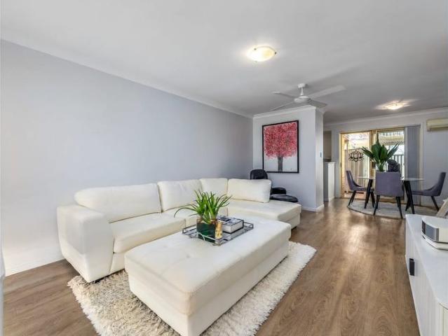 Single level townhome in friendly community
