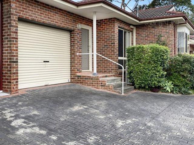 Single level villa in a small block