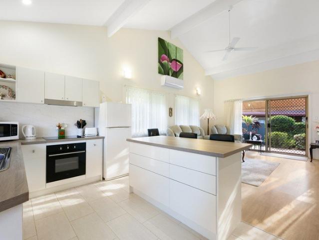 Single level villa style home with Cathedral Ceilings and low body corp!