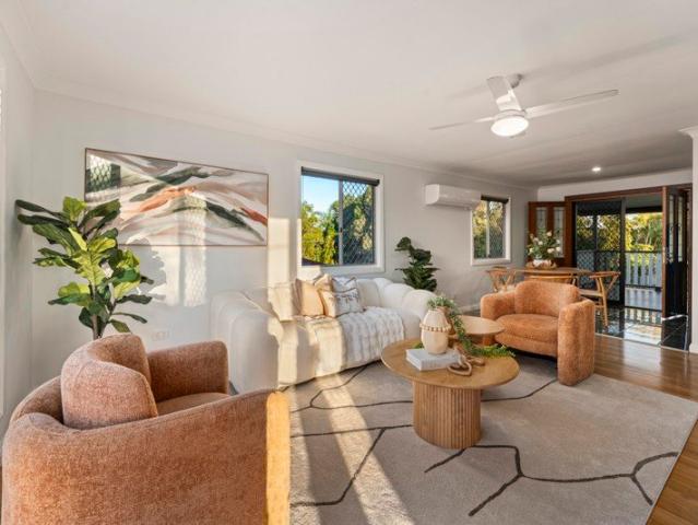 Need Parking? This Home Has Space for 6 Vehicles, a Powered Shed & Side Access