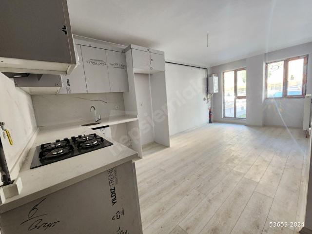 SIFIR YENİ BİNADA  A.AYRANCI GÜLERYÜZ SOKAK TA 1+1 47M2 GİRİŞ KAT ÖNCEPHE KOMBİLİGARAJLI TBMM YANI