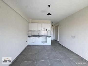 SIFIR BİNA + ASANSÖR ARA KAT EŞYASIZ KİRALIK DAİRE