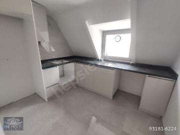 SIFIR BİNADA AYRI MUTFAKLI GENİŞ TERASLI YÜKSEK TAVANLI ÇATI KATI DAİRE 2+1