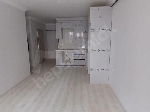 SIFIR BİNADA ACİL SATILIK 1+1 DAİRE