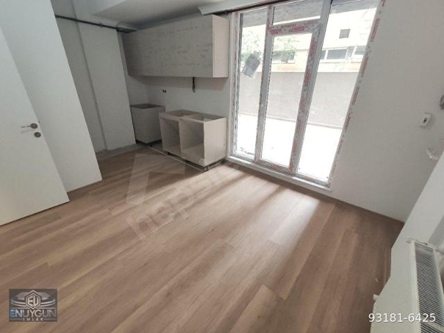 SIFIR BİNADA GENİŞ TERASLI BAHÇE KATI DAİRE 1+1