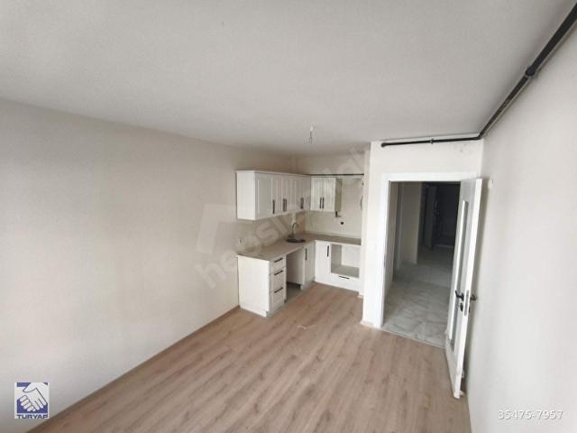 SIFIR BİNADA SATILIK 2+1 DAİRE BAYRAKLI MUHİTTİN ERENER DE