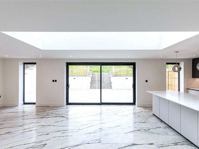 Silver Birches is a brand new four bedroom detached gated house with beautiful rear garden, centred in the Surrey Hills in the heart of Peaslake