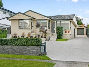 Sitting Tall and Grand sits this beautiful family home