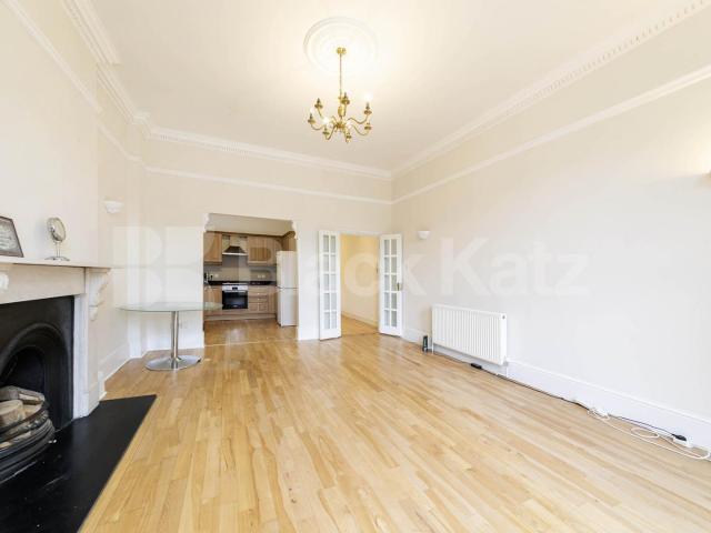 Situated in the heart of Willesden Green, NW2, this spacious four bedroom, four bathroom ground floor apartment offers an exceptional amount of living space and is available for immediate occupation