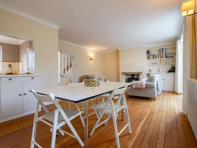 Situated in the highly sought after coastal village of Bosham, West Sussex, this charming three bedroom semi detached house offers a welcoming blend of comfort and practicality