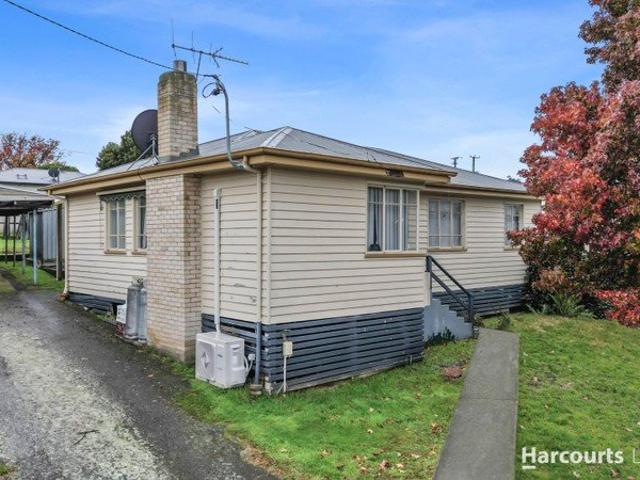 Situated in a convenient location, this family home boasts potential