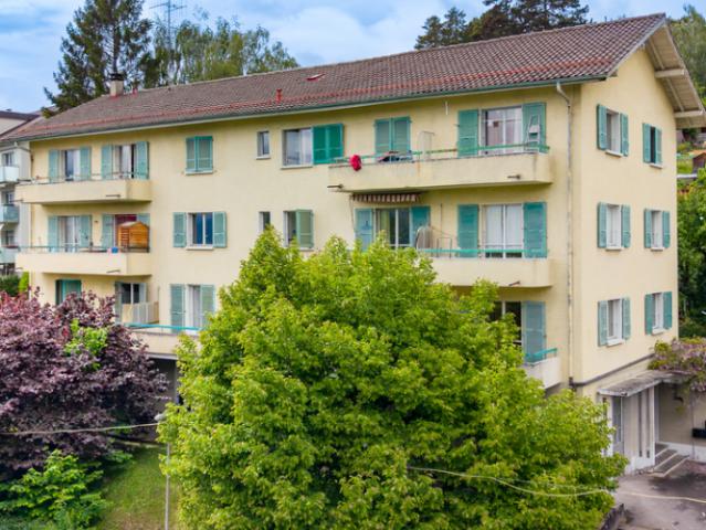 Situé dans un cadre calme et verdoyant, cet appartement lumineux