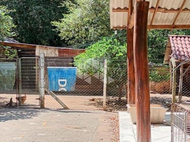 Sítio à venda no Parque Eldorado, com casa de 2 quartos, garagem coberta e outras benfeitorias
