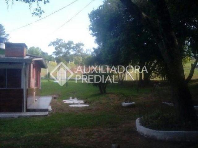 Sitio com construção averbada aceita financiamento