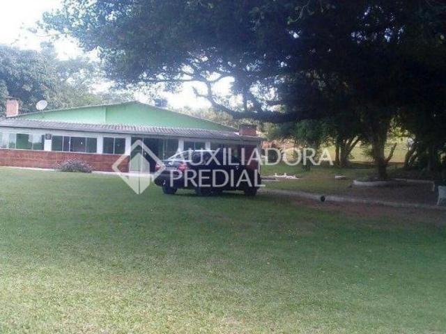 Sitio com construção averbada aceita financiamento