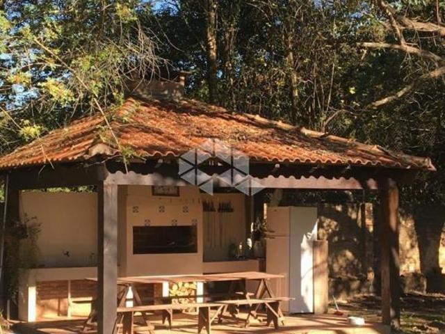 Sítio no Guaíba Country Clube com Casa, Piscina e muita área arborizada Parque Eldorado
