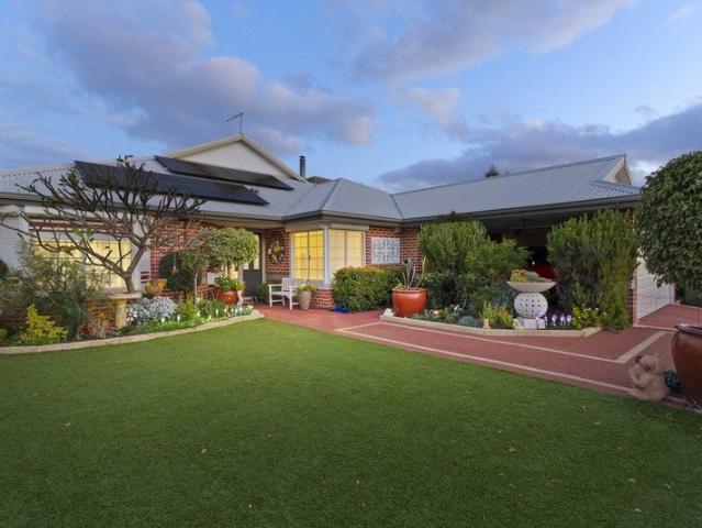 Some homes impress because they're brand new. Others leave a lasting impression because they've simply been loved