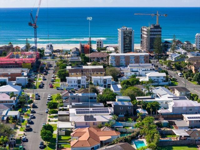 Four bedrooms. Four car accommodation. One exceptional Palm Beach address