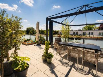 SOMMERAKTION – Dachgeschoss Loft mit Galerie & 50 m² Rooftop Terrasse