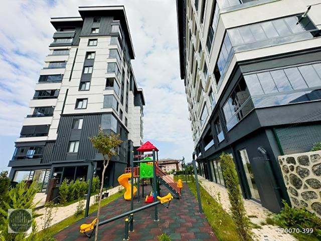 SÖNMEZ'DEN KARŞIYAKA'DA LİLYUM GARDEN SİTESİ EBEVEYN BANYOLU 2+1