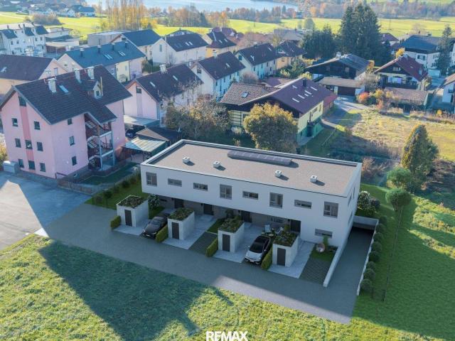 SonnenQuartier 1.0 Eckreihenhaus mit großem Garten und Tiefgarage in Neumarkt am Wallersee