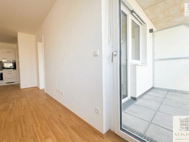Sonnige NEUBAU Wohnung mit Loggia I Tischlerküche I Echtholzparkett
