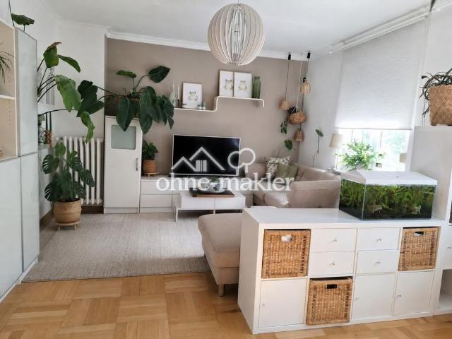 Sonnige Altbauwohnung in bester Citylage mit Garten und Balkon