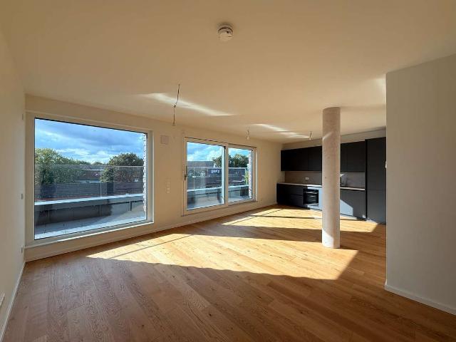 Sonnige Dachterrassenwohnung zum Erstbezug mit Designküche am Wohlers Park