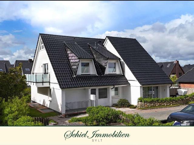 Sonnige 2 Zimmer Maisonette Wohnung mit Süd Terrasse im Haus Aalto in direkter Strandnähe