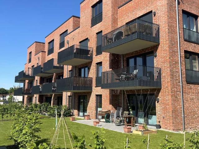 Sonnige 2 Zimmerwohnung mit Garten, Einbauküche und TG Stellplatz