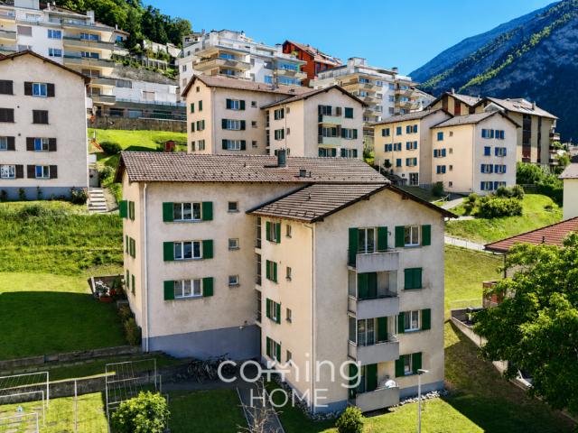 Sonnige 3.5 Zimmerwohnung mit Balkon und Bergsicht in ruhiger Lage
