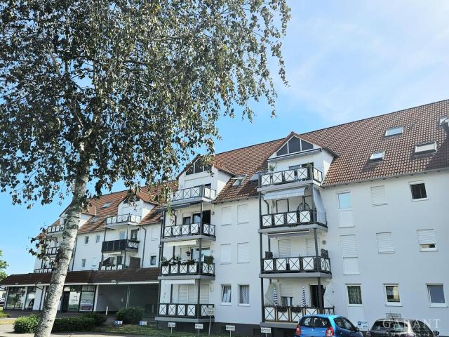 Sonnige 4 Zimmer Wohnung mit schönem Ausblick und zwei Stellplätzen