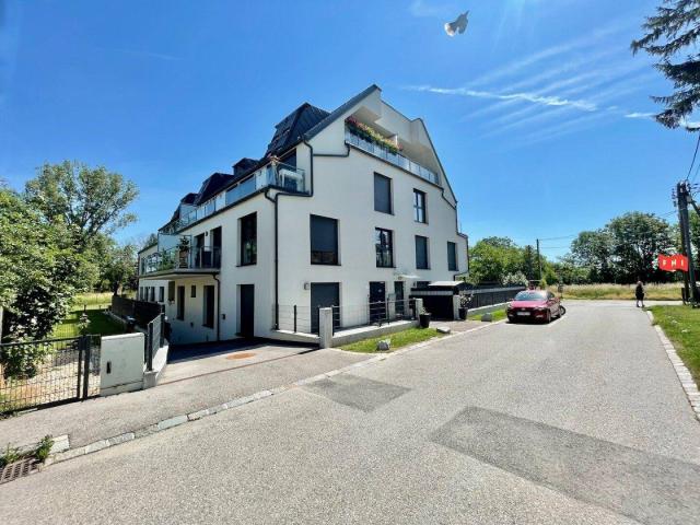 Sonniges 3 Zimmer Neubau Eigentum Bj 2022 mit Terrasse, Tiefgaragenplatz & Grünblick in schöner Ruhelage