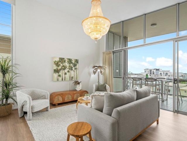 SOARING CEILINGS FLOODED WITH NATURAL LIGHT