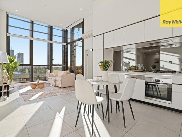 Soaring Ceilings, Skyline Views & Executive Riverside Living