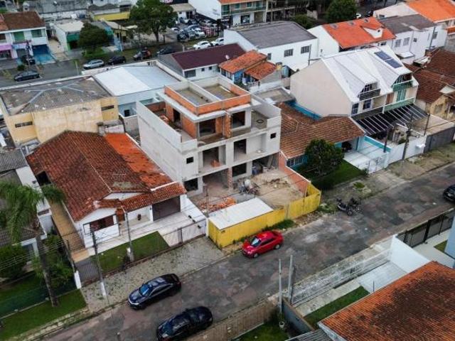 Sobrado moderno à venda no Capão da Imbuia com 191,68 m² terraço incrível e 2 vagas