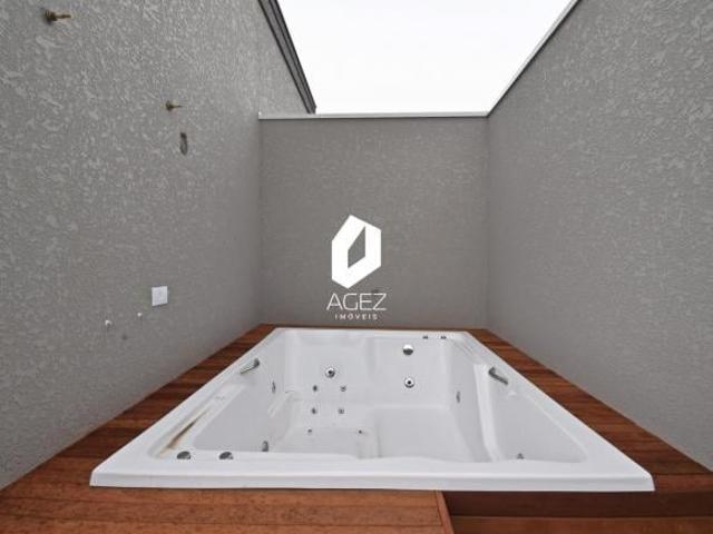 Sobrado novo em condomínio, 03 quartos 01 suíte, terraço com jacuzzi e área gou