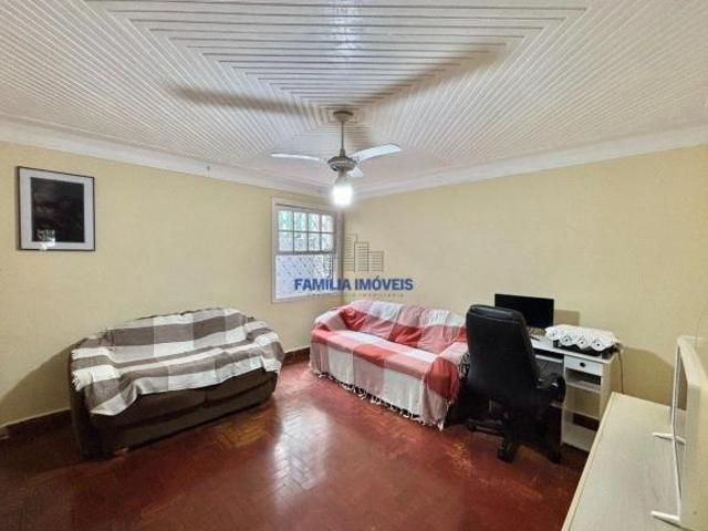 Sobrado à venda 4 quartos varanda quintal Gonzaga Santos/SP