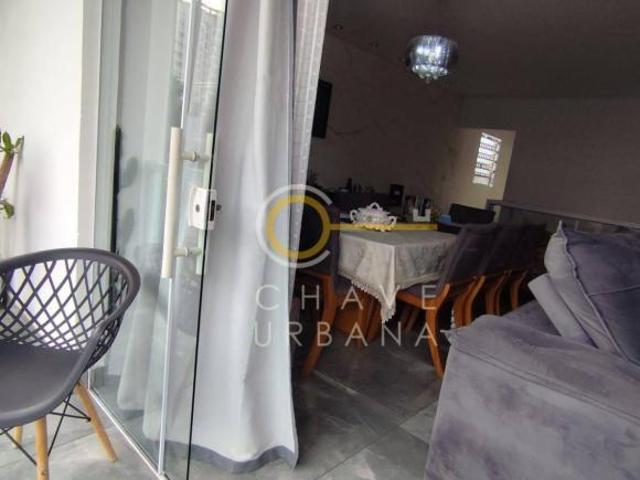 Sobrado com 4 dormitórios à venda, 147 m² por R$ 1.060.000,00 Estuário Santos/SP