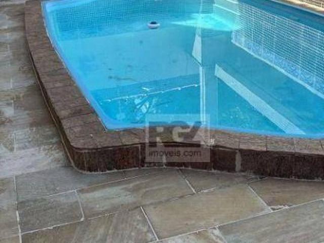 Sobrado com 4 dormitórios à venda, 230 m² por R$ 1.790.000,00 Ponta da Praia Santos/SP