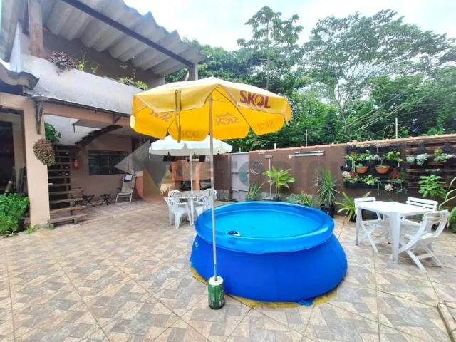 Sobrado com 4 dormitórios à venda, 351 m² por R$ 850.000,00 Massaguaçu Caraguatatuba/SP