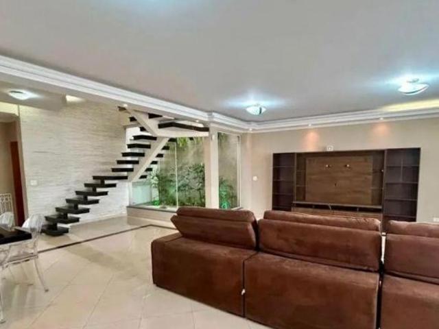 Sobrado com 4 dormitórios à venda, 462 m² por R$ 2.120.000,00 Vila Galvão Gu