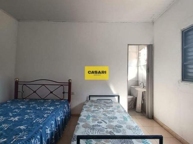Sobrado com 4 dormitórios sendo 3 suítes, sala, cozinha, área de serviço e garag