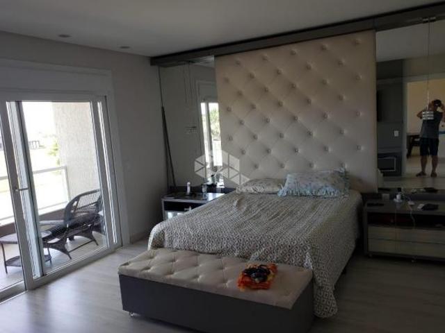 Sobrado com 4 suítes dormitórios, 02 vagas/box, condomínio Capão Ilhas Resort