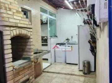 Sobrado à venda, 98 m² por R$ 680.000,00 Marapé Santos/SP