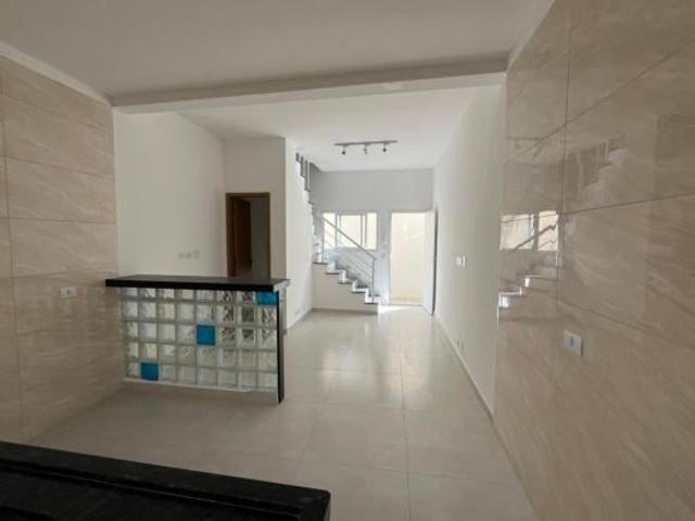 Sobrado com 2 dormitórios à venda, 51 m² por R$ 380.000,00 Aviação Praia Grande/SP