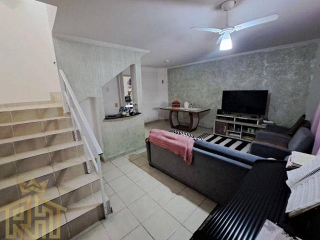 Sobrado com 3 dormitórios à venda, 106 m² por R$ 595.000,00 tude basto Praia Grande/SP