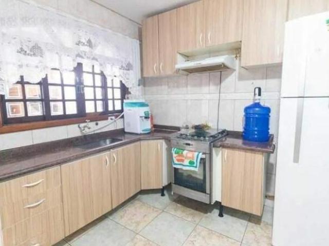 Sobrado com 3 dormitórios à venda, 125 m² por R$ 600.000 Centreville Santo A
