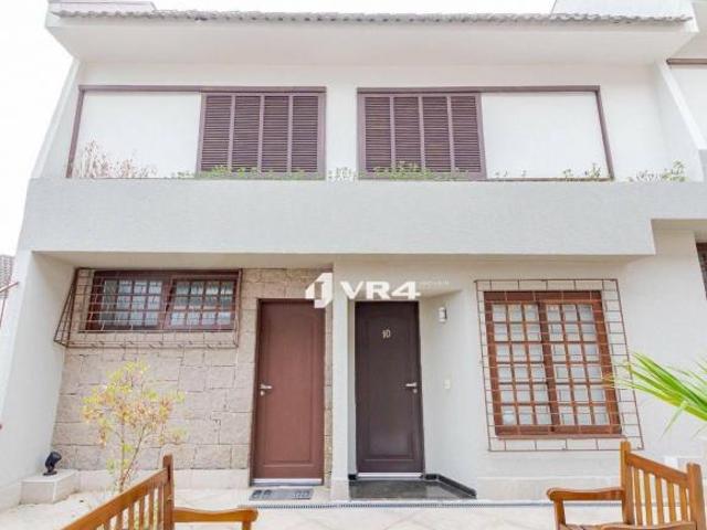 Sobrado com 3 dormitórios à venda, 157 m² por R$ 779.900 Guabirotuba Curitiba