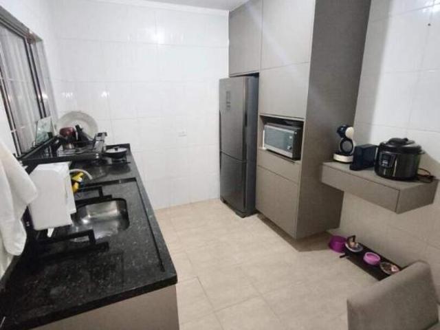 Sobrado à venda no Tude Bastos, Praia Grande 2 dorms, 2 banheiros, 1 vaga